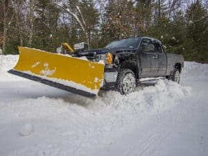 How To Protect Your Lawn and Property From a Snow Plow