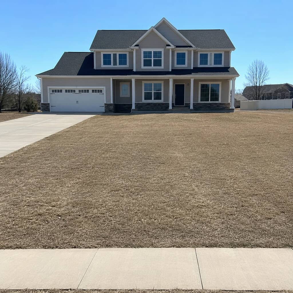 A Front Yard That's All Lawn and Nothing Else