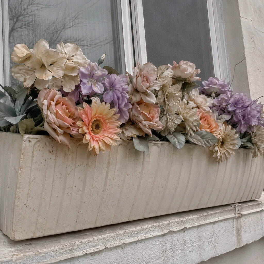 Fake it with plastic or artificial flowers