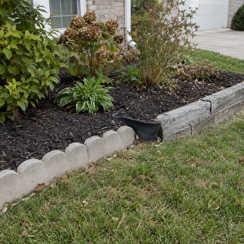 Three Different Kinds of Bed Edging in One Front Yard