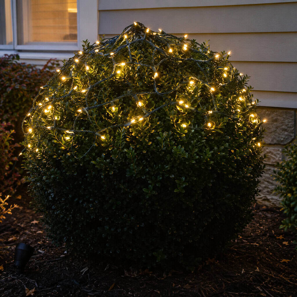 Net Lights Thrown Over Shrubs Like a Hairnet